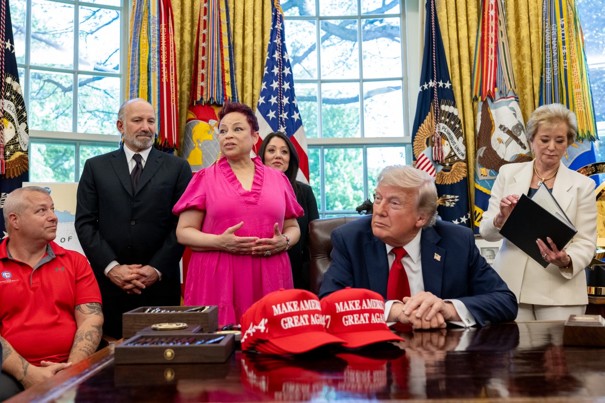 President Donald Trump signs executive orders alongside Secretary of Education Linda McMahon and wounded warriors in the Oval Office, Wednesday, April 23, 2025. (Official White House Photo by Molly Riley)