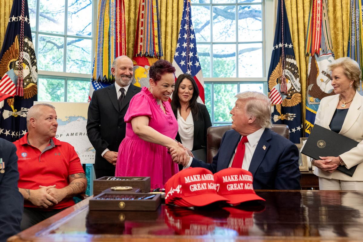 President Donald Trump signs executive orders alongside Secretary of Education Linda McMahon and wounded warriors in the Oval Office, Wednesday, April 23, 2025. (Official White House Photo by Molly Riley)