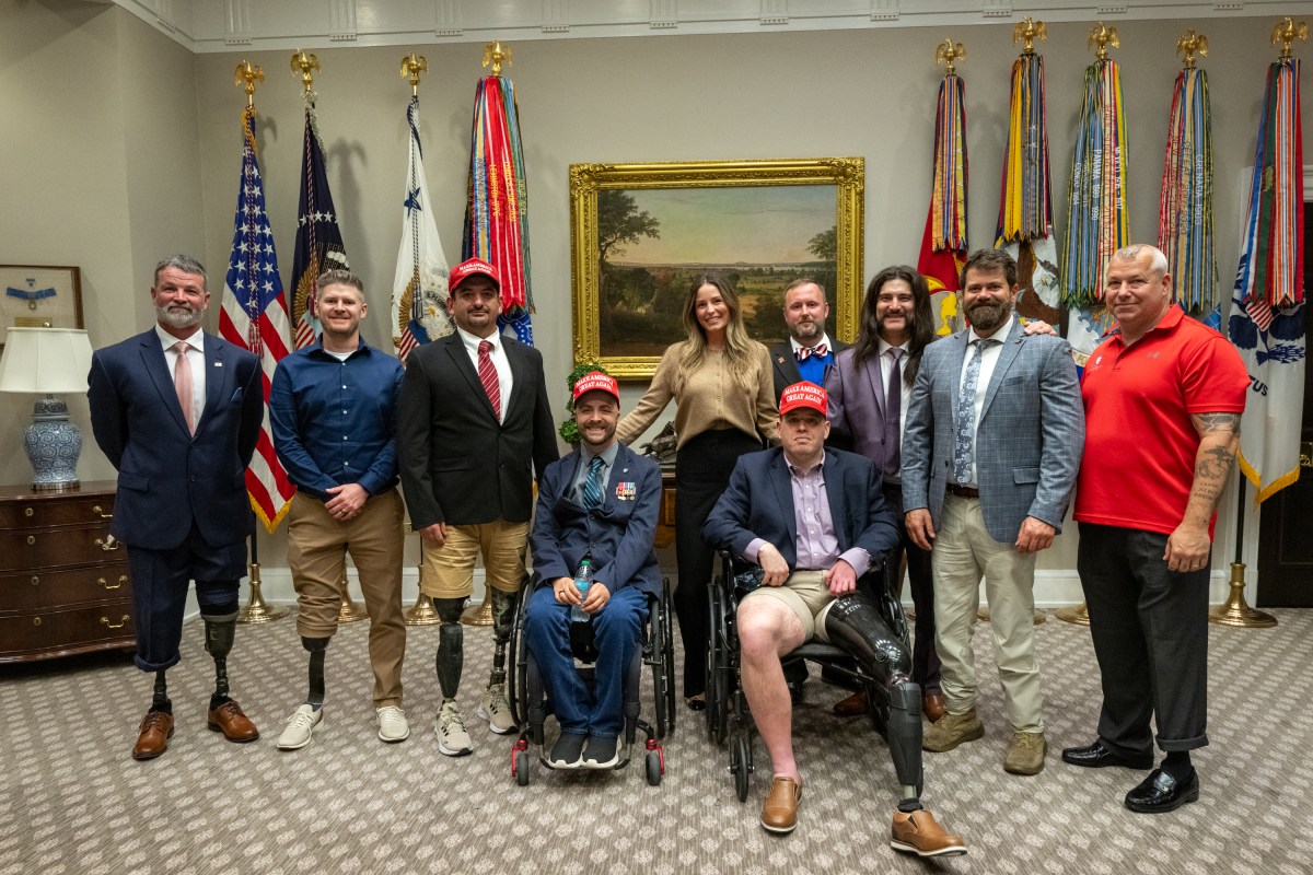 President Donald Trump signs executive orders alongside Secretary of Education Linda McMahon and wounded warriors in the Oval Office, Wednesday, April 23, 2025. (Official White House Photo by Molly Riley)