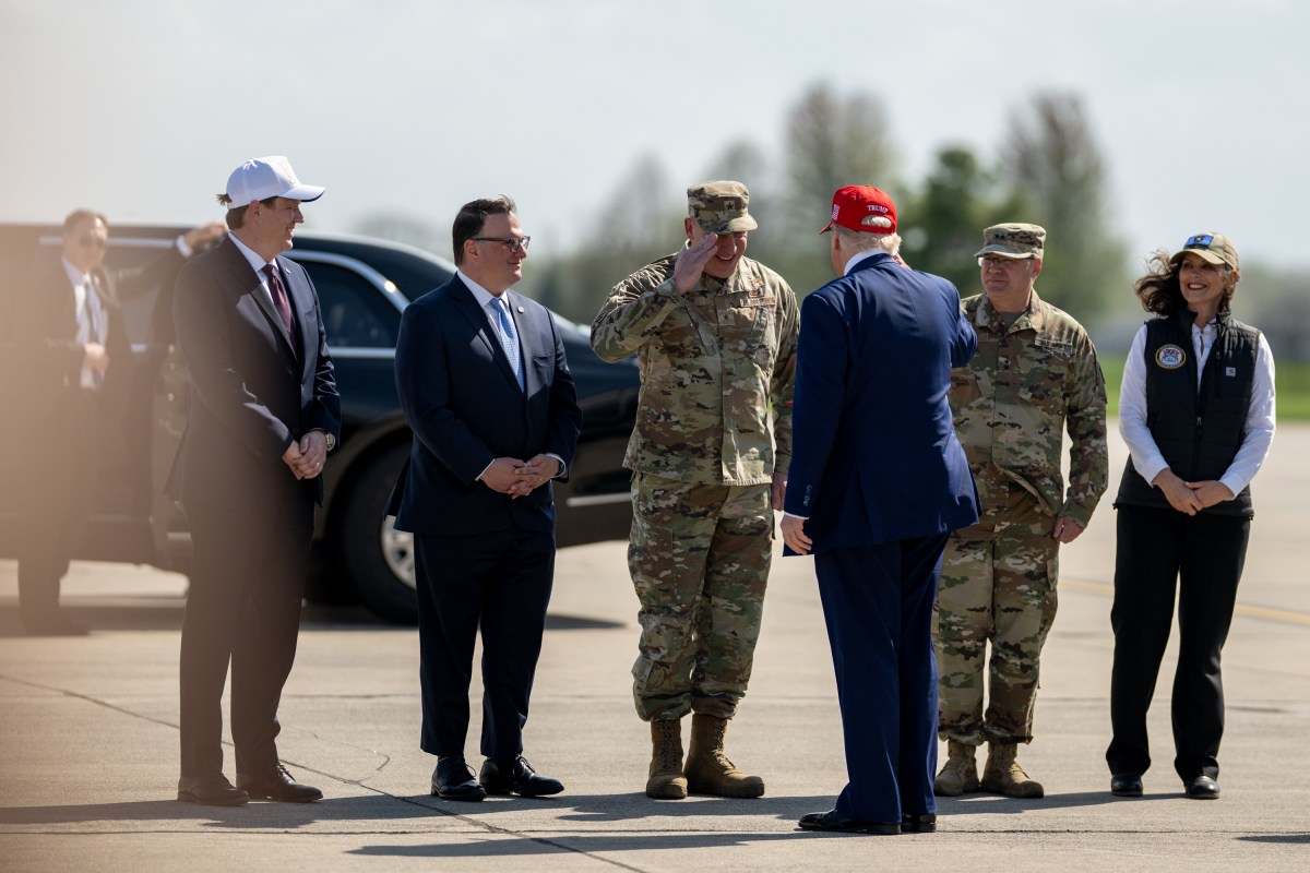 President Donald Trump greets Michigan Governor Gretchen Whitmer and others after disembarking Air Force One at Selfridge Air National Guard Base in Harrison Township, Michigan, Tuesday, April 29, 2025.(Official White House Photo by Daniel Torok)