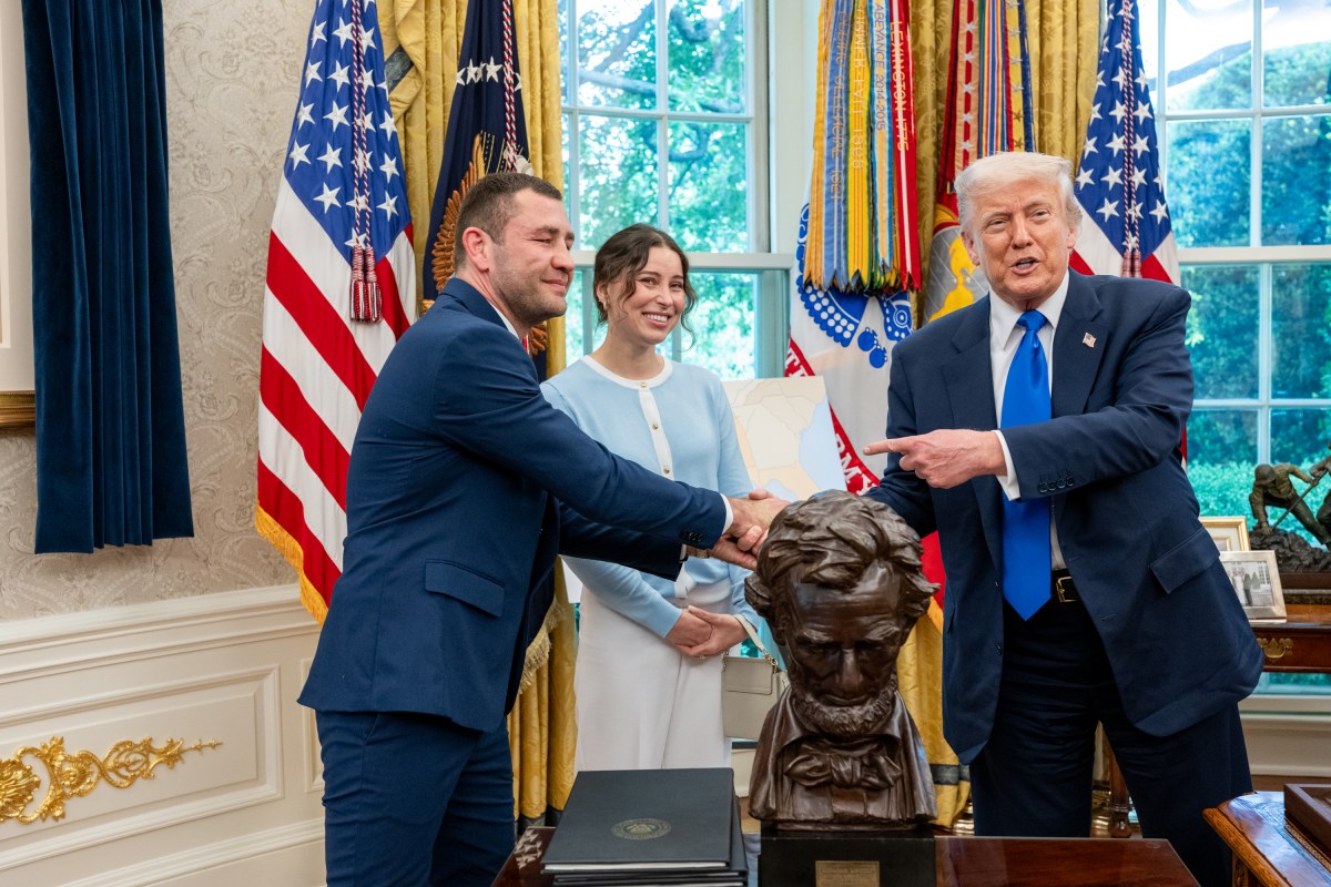 President Donald Trump meets with Ksenia Karelina, American ballerina freed from a Russian prison, and her boyfriend, South African boxer Chris Van Heerden, Monday, May 5, 2025. (Official White House Photo by Joyce N. Boghosian)