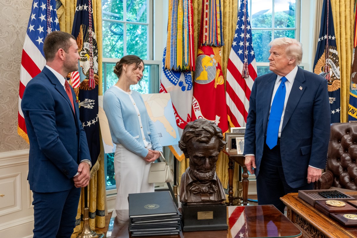 President Donald Trump meets with Ksenia Karelina, American ballerina freed from a Russian prison, and her boyfriend, South African boxer Chris Van Heerden, Monday, May 5, 2025. (Official White House Photo by Joyce N. Boghosian)