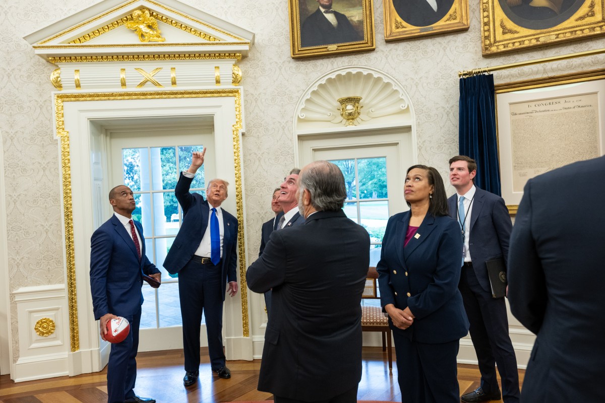President Donald Trump points out renovations to the Oval Office after an announcement that Washington, D.C. will host the 2027 NFL Draft, Monday, May 5, 2025. (Official White House Photo by Molly Riley)