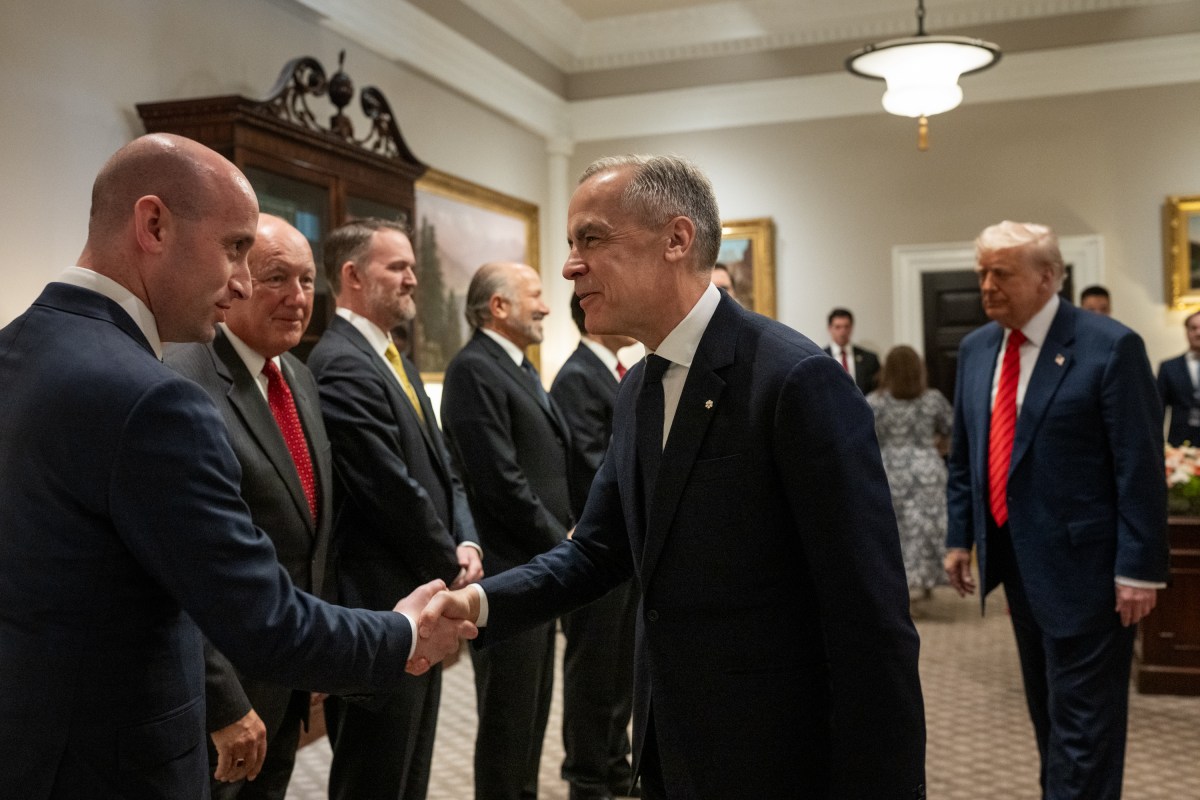 Prime Minister of Canada Mark Carney greets Deputy Chief  of Staff Stephen Miller and members of the U.S. delegation in the West Wing Lobby, Tuesday, May 6, 2025, before a meeting with President Donald Trump. (Official White House Photo by Molly Riley)
