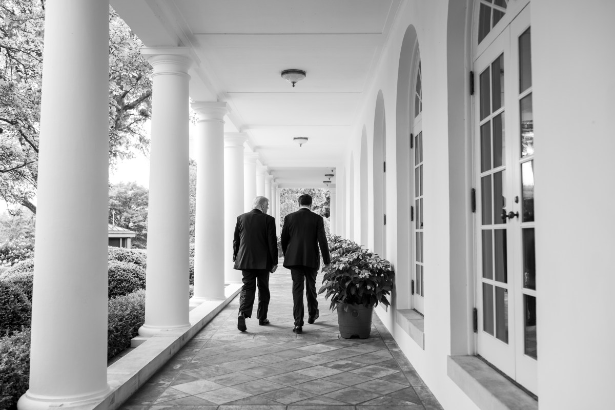 President Donald Trump and Vice President JD Vance walk along the Colonnade towards the Oval Office, Thursday, May 8, 2025. (Official White House Photo by Molly Riley)