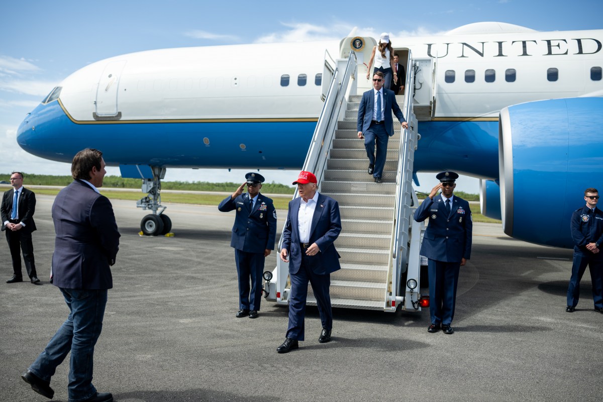 President Donald Trump greets Florida Governor Ron DeSantis (R) and Secretary of Homeland Security Kristi Noem at Dade-Collier Training and Transition Airport in Ochopee, Florida, Tuesday, July 1, 2025. (Official White House Photo by Daniel Torok)