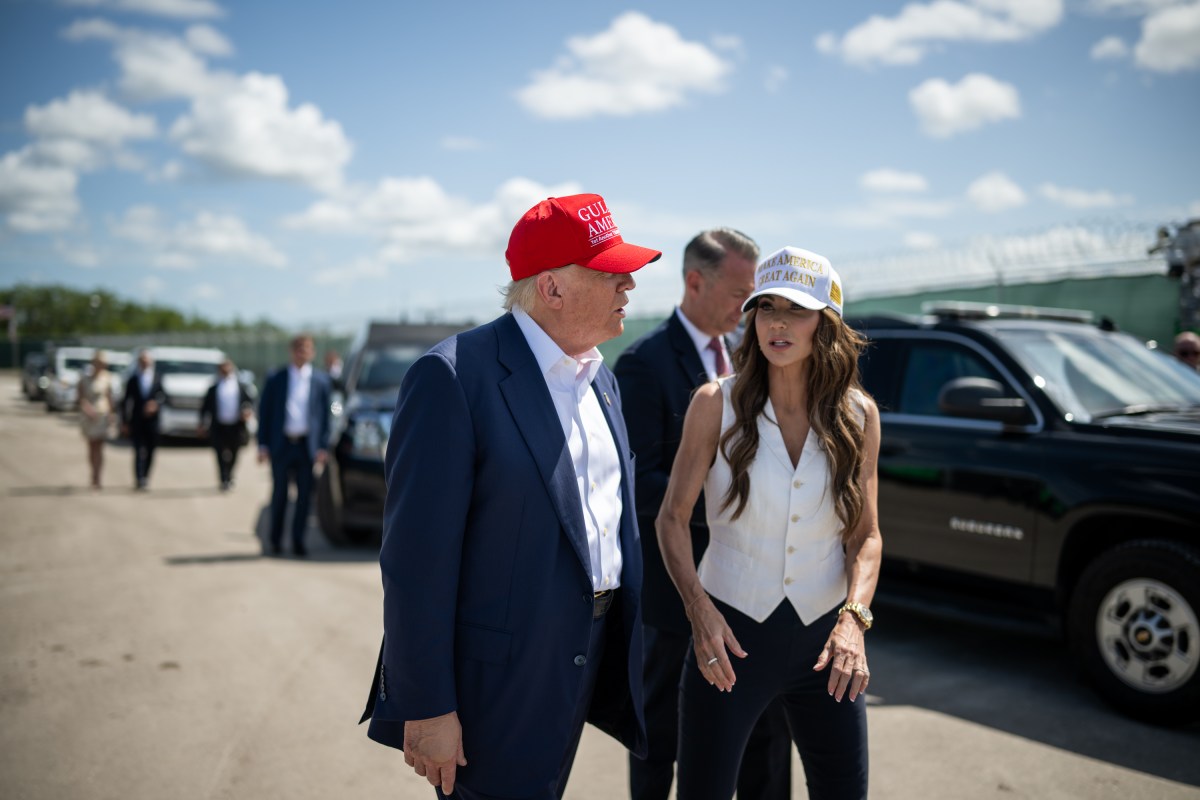 President Donald Trump speaks with Secretary of Homeland Security Kristi Noem during a walking tour of the immigration detention center nicknamed “Alligator Alcatraz”, Tuesday, July 1, 2025, in Ochopee, Florida. (Official White House Photo by Daniel Torok)