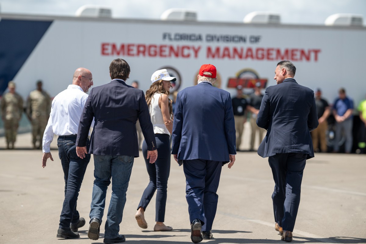 President Donald Trump speaks with Secretary of Homeland Security Kristi Noem during a walking tour of the immigration detention center nicknamed “Alligator Alcatraz”, Tuesday, July 1, 2025, in Ochopee, Florida. (Official White House Photo by Daniel Torok)