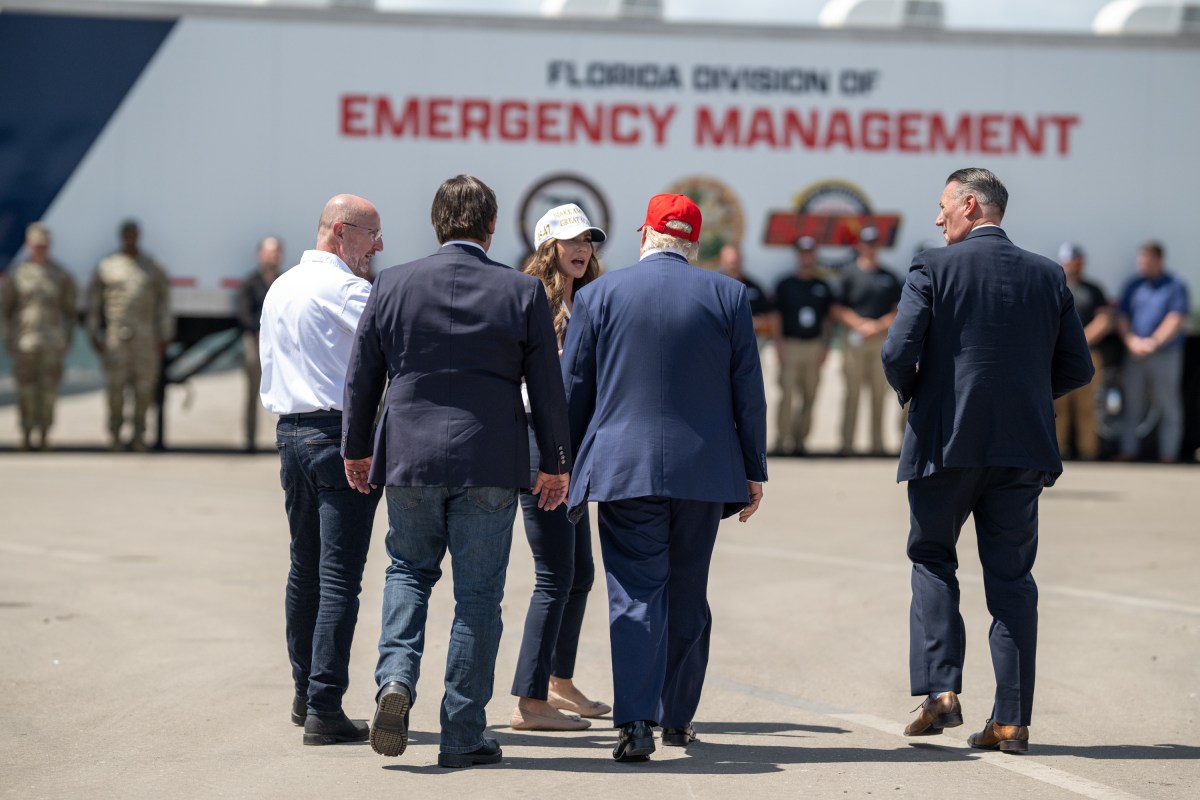 President Donald Trump speaks with Secretary of Homeland Security Kristi Noem during a walking tour of the immigration detention center nicknamed “Alligator Alcatraz”, Tuesday, July 1, 2025, in Ochopee, Florida. (Official White House Photo by Daniel Torok)