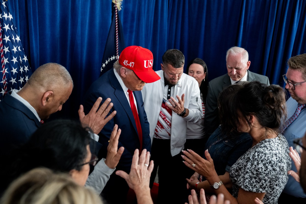 President Donald Trump participates in a prayer before a rally in Des Moines, Iowa, Thursday, July 3, 2025. (Official White House Photo by Daniel Torok)
