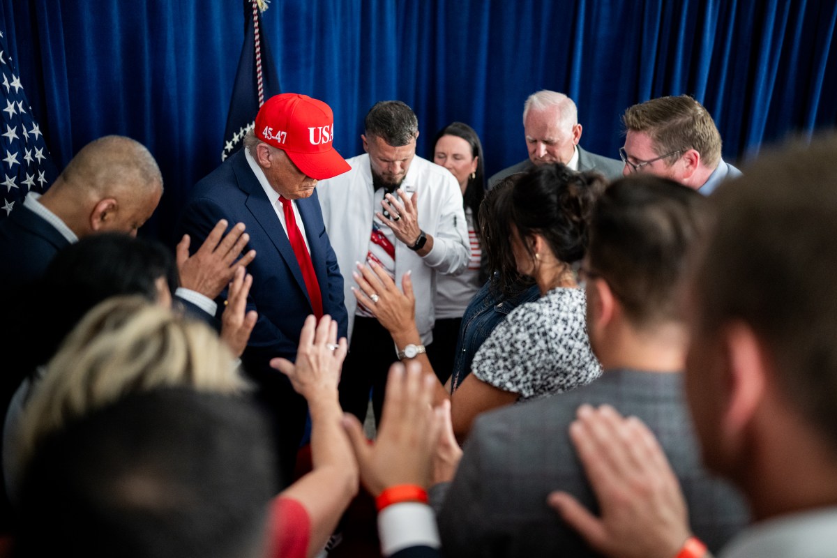President Donald Trump participates in a prayer before a rally in Des Moines, Iowa, Thursday, July 3, 2025. (Official White House Photo by Daniel Torok)