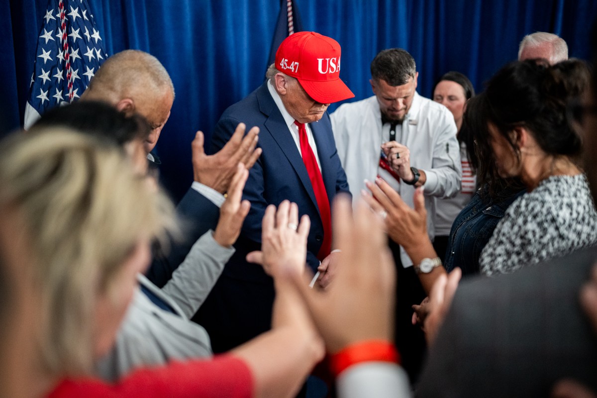 President Donald Trump participates in a prayer before a rally in Des Moines, Iowa, Thursday, July 3, 2025. (Official White House Photo by Daniel Torok)