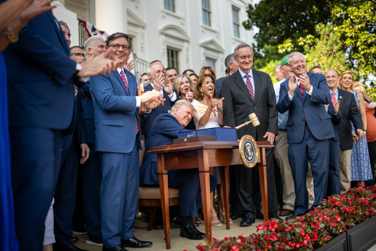 President Donald Trump hammers a gavel after signing the One Big Beautiful Bill Act on the South Lawn of the White House, Friday, July 4, 2025, during the 4th of July picnic. (Official White House Photo by Daniel Torok)