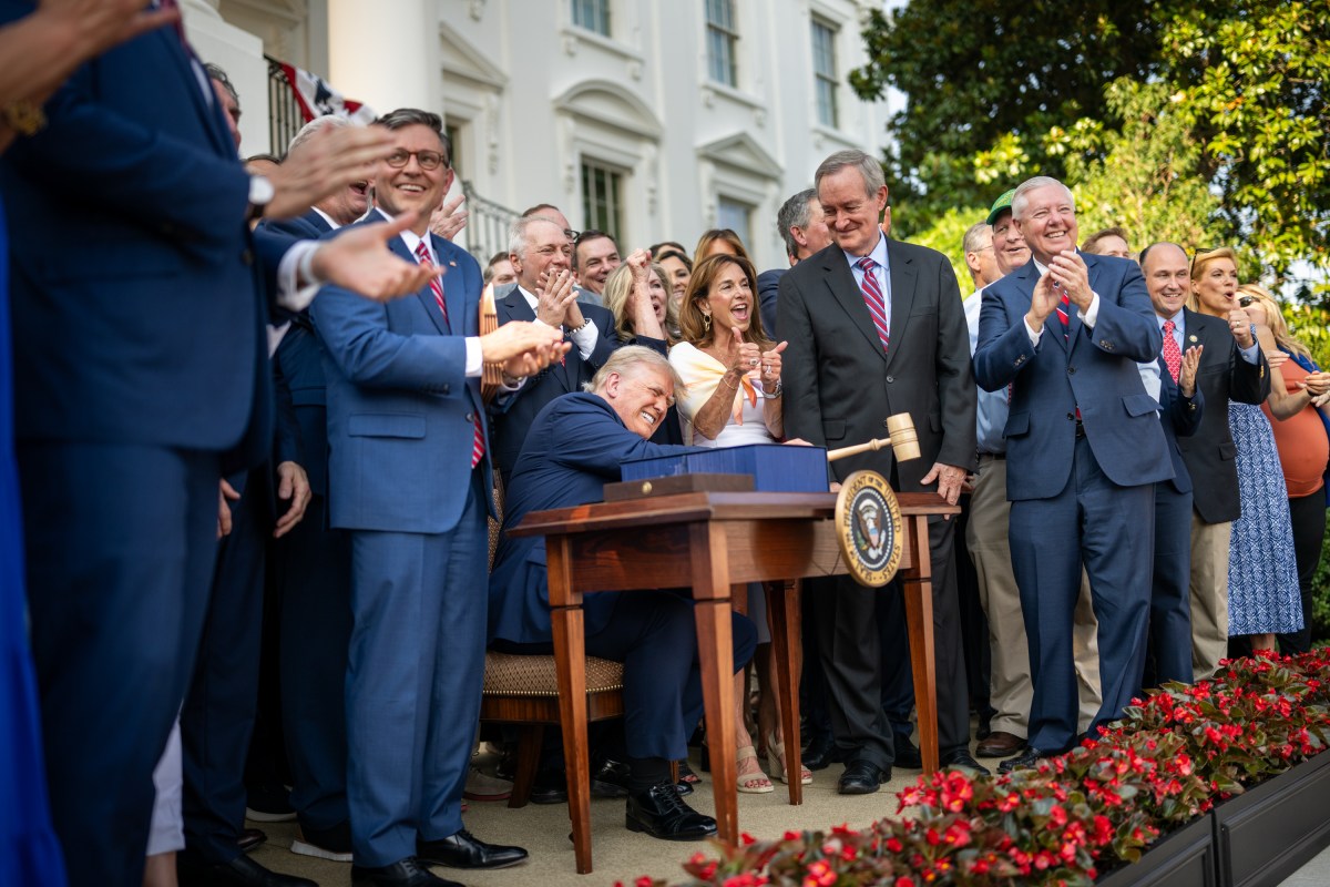 President Donald Trump hammers a gavel after signing the One Big Beautiful Bill Act on the South Lawn of the White House, Friday, July 4, 2025, during the 4th of July picnic. (Official White House Photo by Daniel Torok)