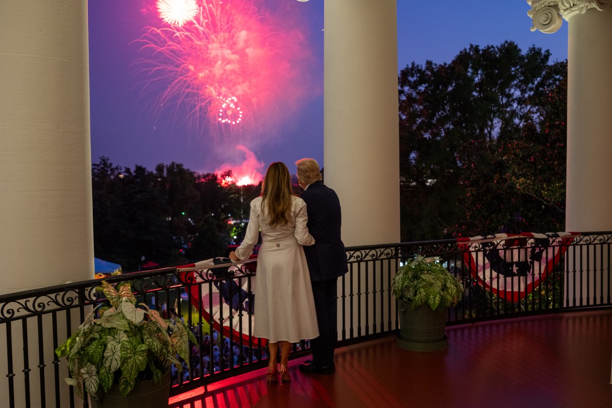 President Donald Trump and First Lady Melanie Trump view a 4th of July fireworks display over the National Mall from the Blue Room Balcony, Friday, July 4, 2025. (Official White House Photo by Daniel Torok)