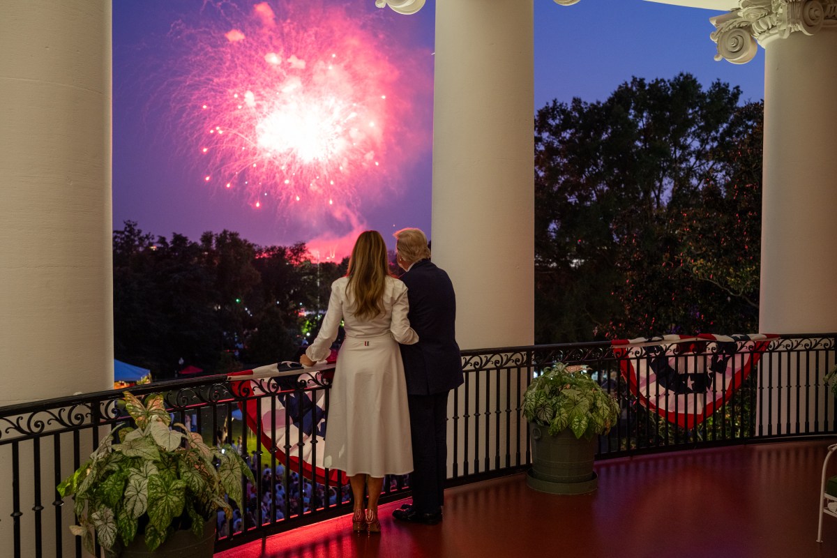 President Donald Trump and First Lady Melanie Trump view a 4th of July fireworks display over the National Mall from the Blue Room Balcony, Friday, July 4, 2025. (Official White House Photo by Daniel Torok)
