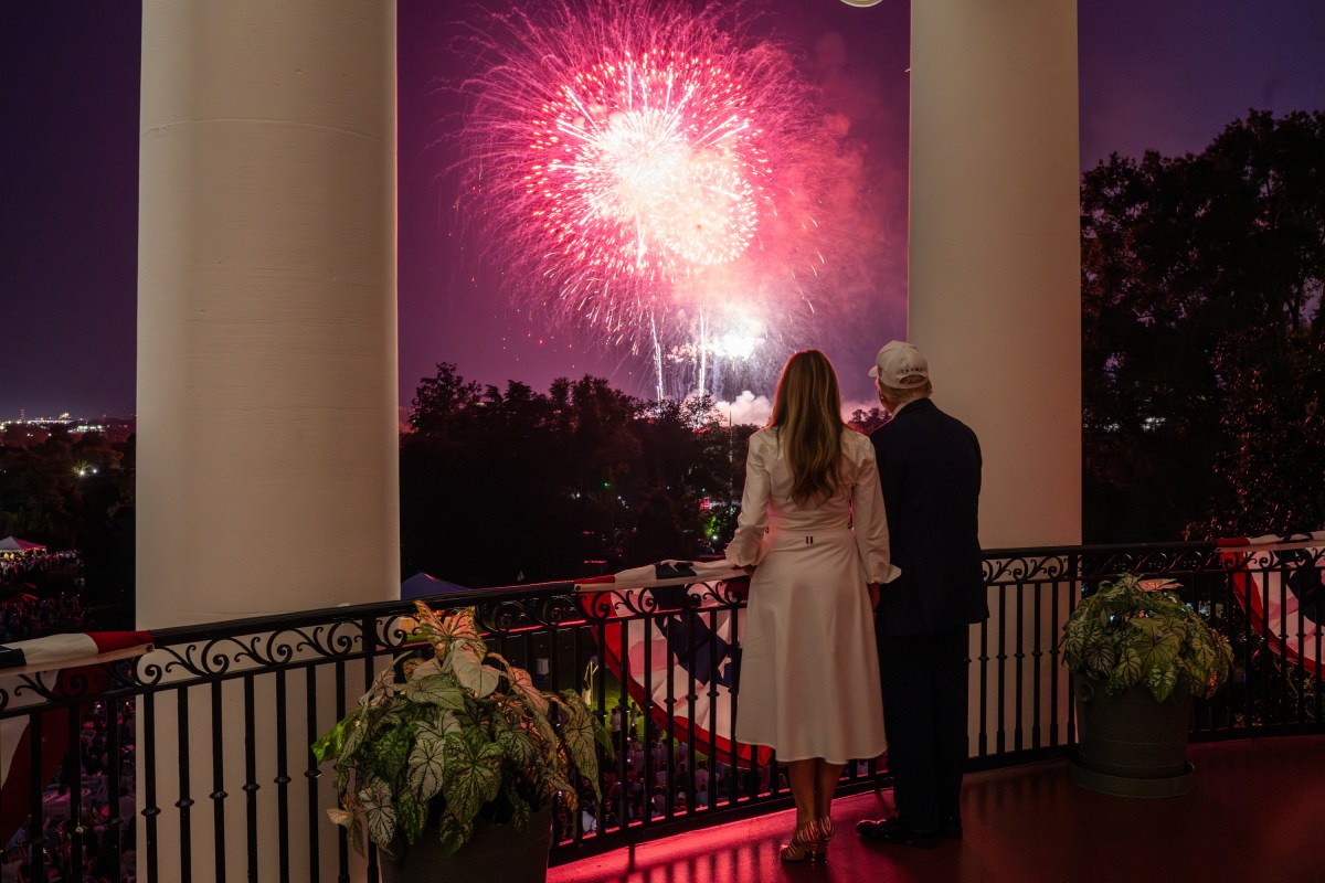 President Donald Trump and First Lady Melanie Trump view a 4th of July fireworks display over the National Mall from the Blue Room Balcony, Friday, July 4, 2025. (Official White House Photo by Daniel Torok)