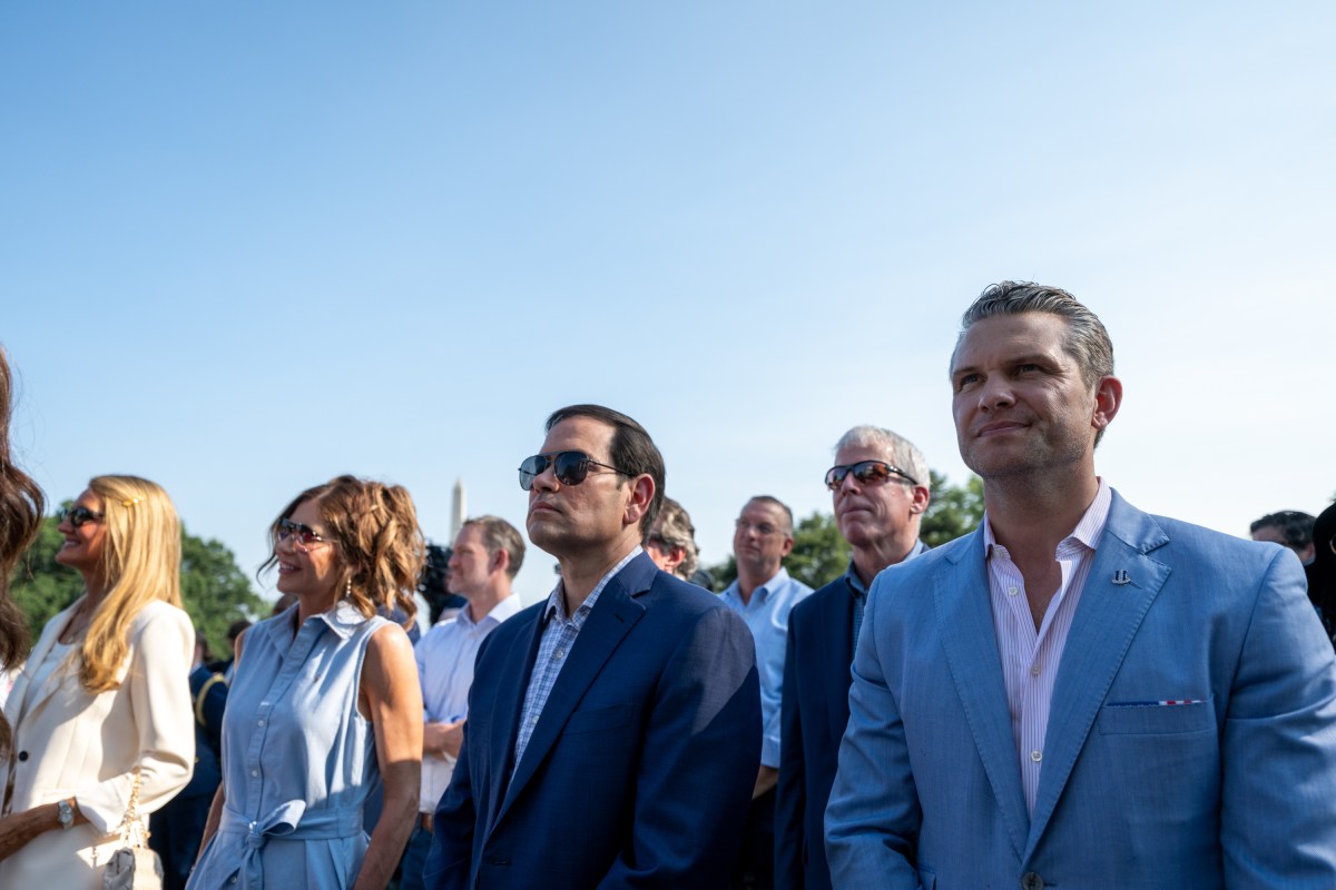 Secretary of Homeland Security Kristi Noem, Secretary of State Marco Rubio, and Secretary of Defense Pete Hegseth watch President Donald Trump deliver remarks before signing the One Big Beautiful Bill Act on the South Lawn of the White House, Friday, July 4, 2025, during the 4th of July picnic. (Official White House Photo by Molly Riley)