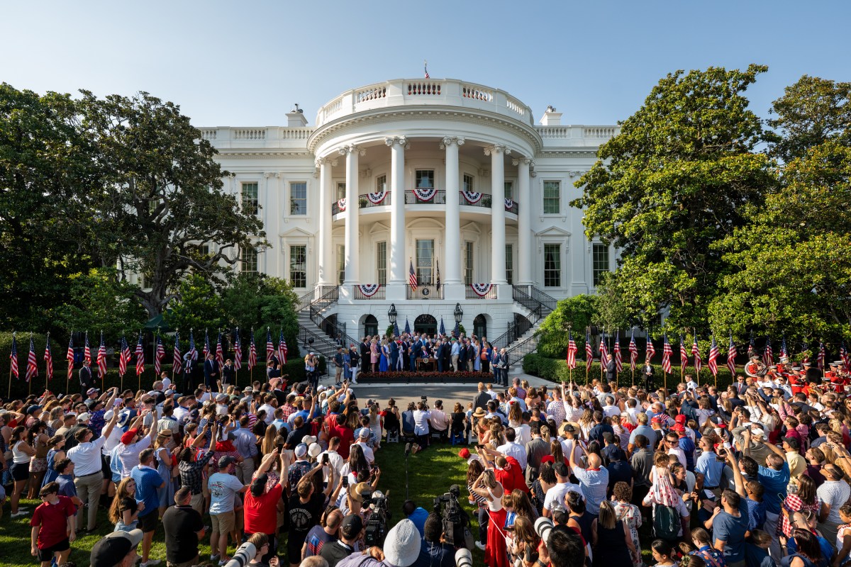 President Donald Trump signs the One Big Beautiful Bill Act on the South Lawn of the White House, Friday, July 4, 2025, during the 4th of July picnic. (Official White House Photo by Molly Riley)