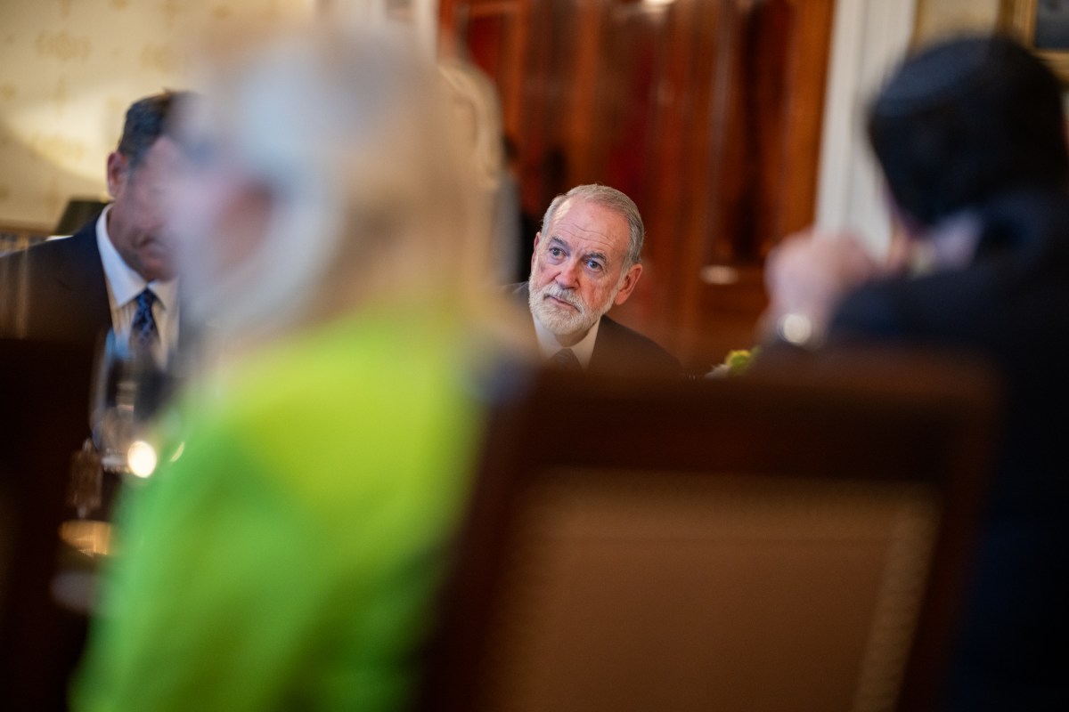 Ambassador to Israel Mike Huckabee looks on as President Donald Trump speaks to the press during a bilateral dinner with Israeli Prime Minister Benjamin Netanyahu, Monday, July 7, 2025, in the Blue Room. (Official White House Photo by Daniel Torok)