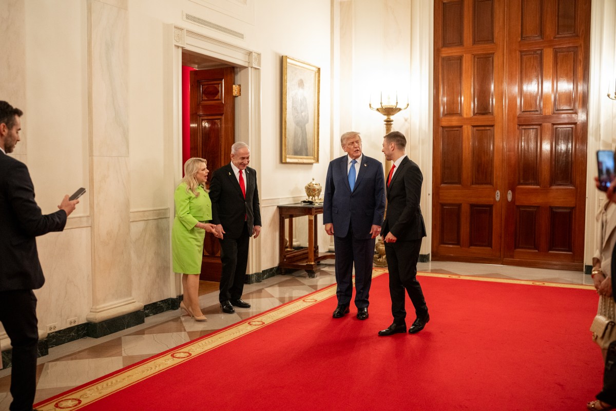 President Donald Trump speaks to Israeli Prime Minister Benjamin Netanyahu in the Cross Hall after a bilateral dinner in the Blue Room, Monday, July 7, 2025. (Official White House Photo by Daniel Torok)