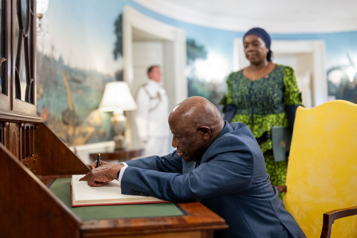 President Joseph Nyuma Boakai of Liberia at the South Portico signs the guest book in the Diplomatic Reception Room of the White House, Wednesday, July 9, 2025, before attending a multilateral luncheon with President Donald Trump and other African leaders. (Official White House Photo by Molly Riley)