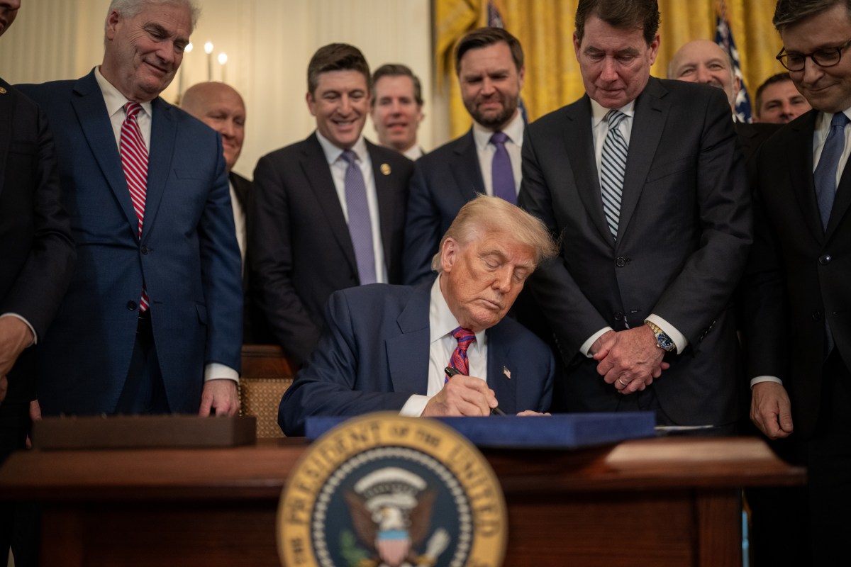 President Donald Trump signs S.1852, The GENIUS Act, Friday, July 18, 2025, in the East Room of the White House. (Official White House Photo by Daniel Torok)