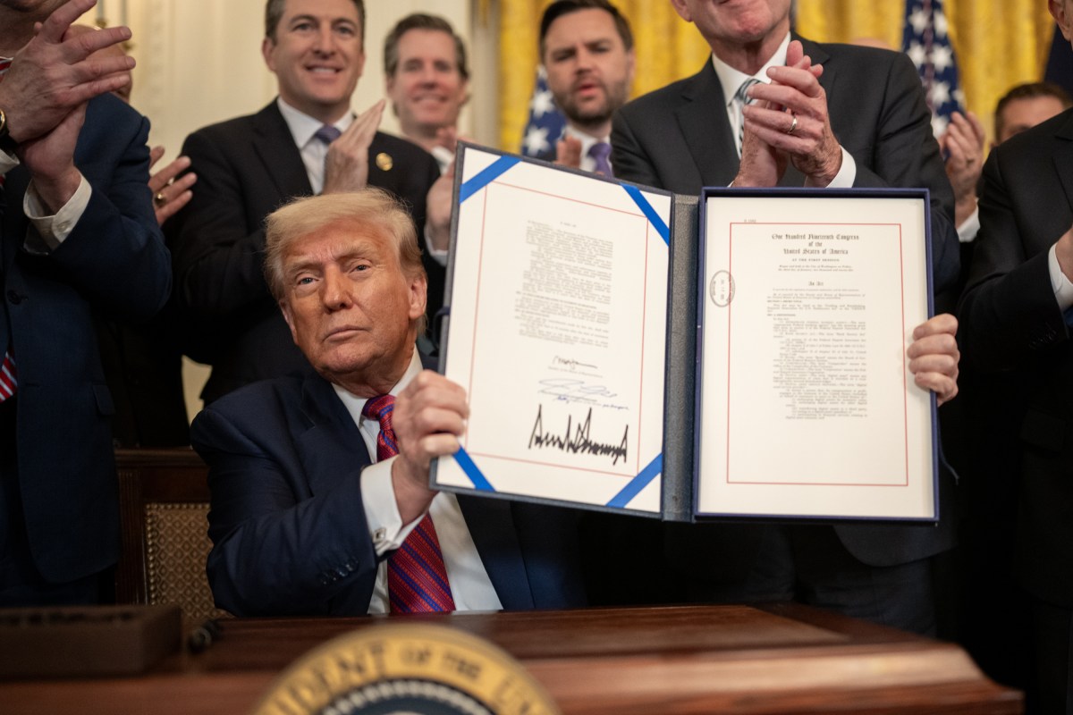President Donald Trump signs S.1852, The GENIUS Act, Friday, July 18, 2025, in the East Room of the White House. (Official White House Photo by Daniel Torok)