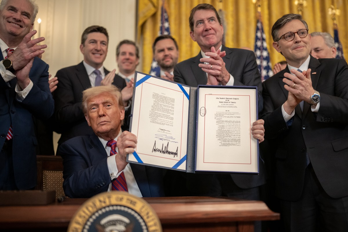 President Donald Trump signs S.1852, The GENIUS Act, Friday, July 18, 2025, in the East Room of the White House. (Official White House Photo by Daniel Torok)