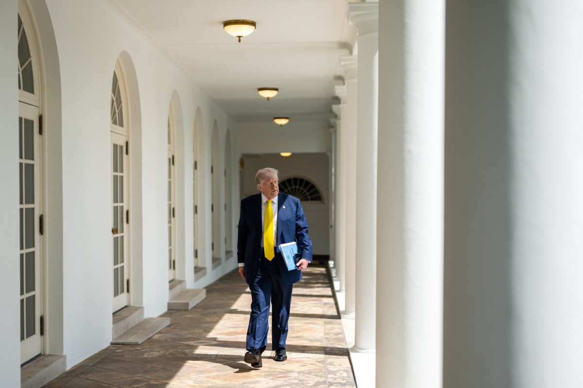 President Donald Trump walks on the West Colonnade to the Oval Office, Monday, July 21, 2025. (Official White House Photo by Molly Riley)