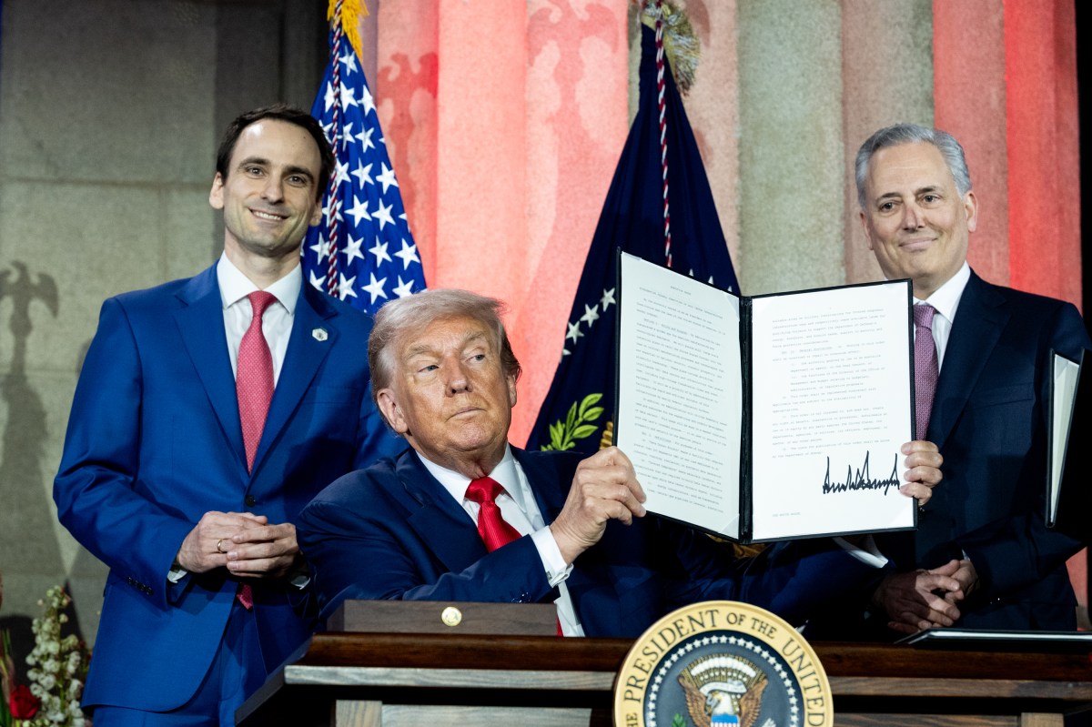 President Donald Trump signs Executive Orders at the White House AI Summit at Andrew W. Mellon Auditorium in Washington, D.C., Wednesday, July 23, 2025. (Official White House Photo by Joyce N. Boghosian)