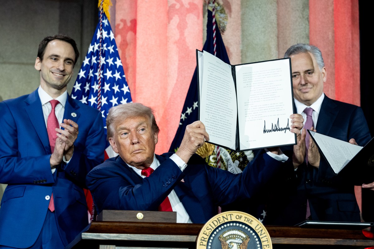 President Donald Trump signs Executive Orders at the White House AI Summit at Andrew W. Mellon Auditorium in Washington, D.C., Wednesday, July 23, 2025. (Official White House Photo by Joyce N. Boghosian)