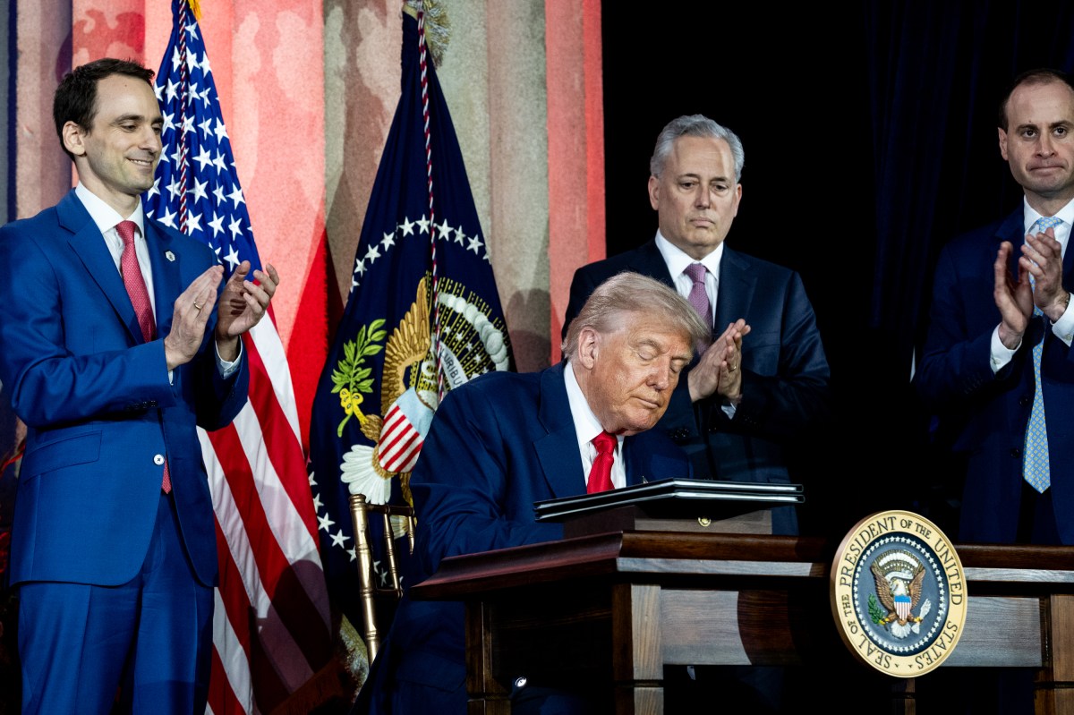 President Donald Trump signs Executive Orders at the White House AI Summit at Andrew W. Mellon Auditorium in Washington, D.C., Wednesday, July 23, 2025. (Official White House Photo by Joyce N. Boghosian)