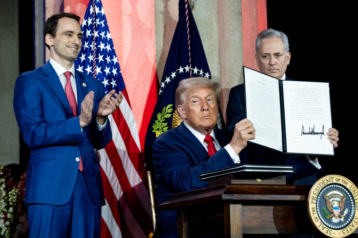 President Donald Trump signs Executive Orders at the White House AI Summit at Andrew W. Mellon Auditorium in Washington, D.C., Wednesday, July 23, 2025. (Official White House Photo by Joyce N. Boghosian)