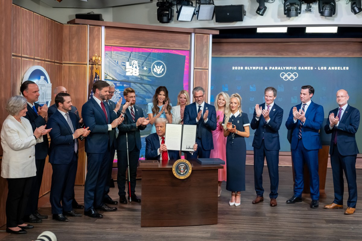 President Donald Trump signs an executive order creating a task force for the 2028 Los Angeles Olympics, Tuesday, August 5, 2025, in the South Court Auditorium of the Eisenhower Executive Office Building at the White House. Vice President JD Vance attends. (Official White House Photo by Emily J. Higgins.)