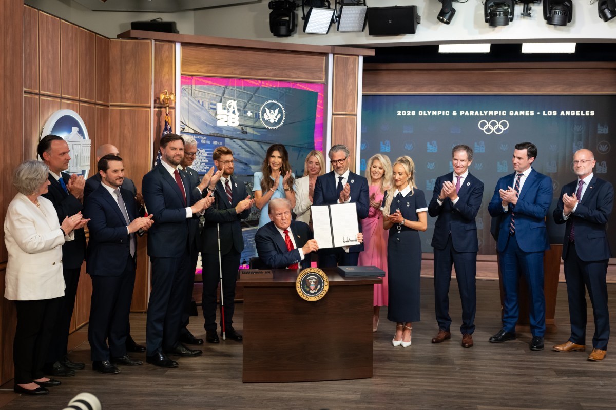 President Donald Trump signs an executive order creating a task force for the 2028 Los Angeles Olympics, Tuesday, August 5, 2025, in the South Court Auditorium of the Eisenhower Executive Office Building at the White House. Vice President JD Vance attends. (Official White House Photo by Emily J. Higgins.)