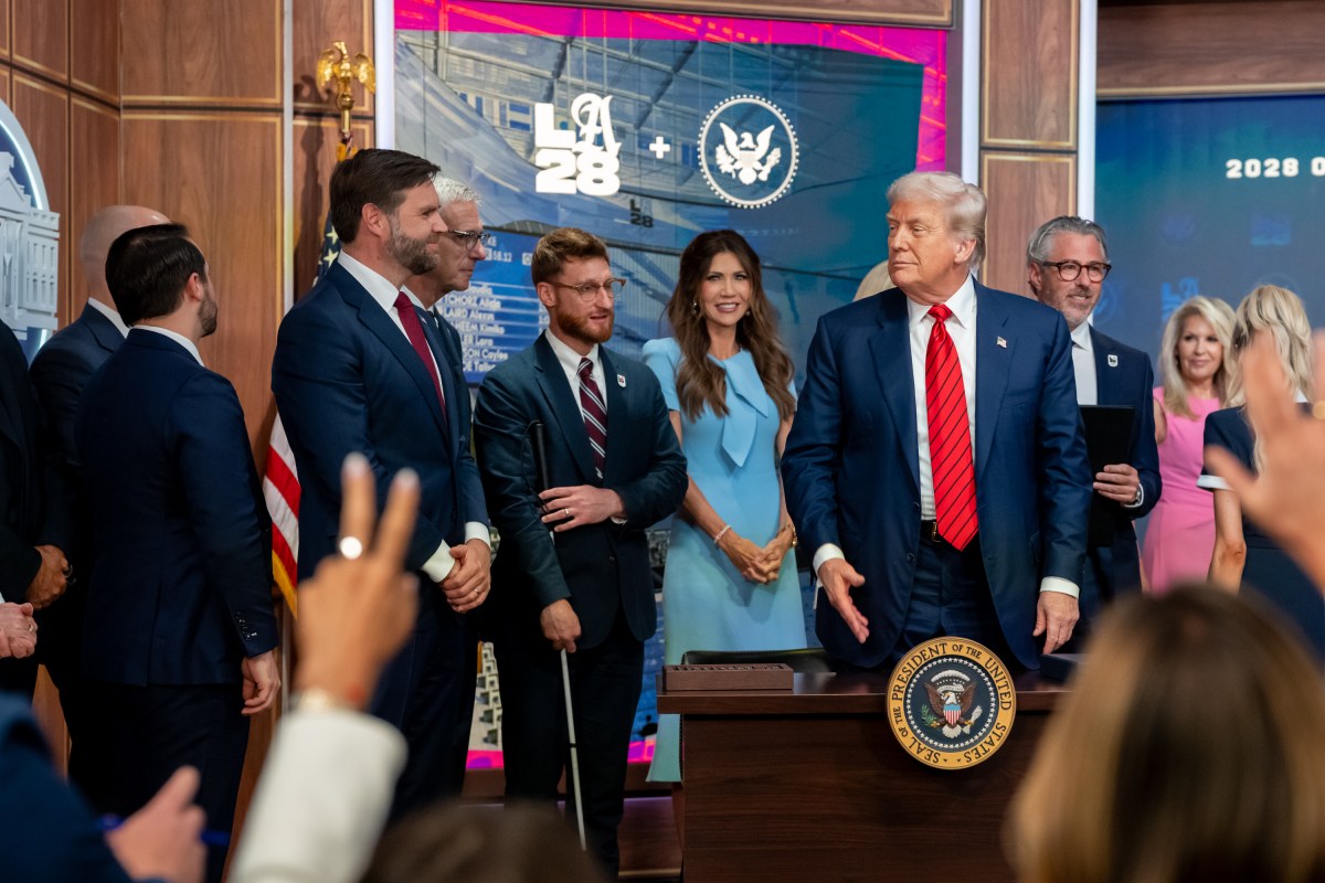 President Donald Trump signs an executive order creating a task force for the 2028 Los Angeles Olympics, Tuesday, August 5, 2025, in the South Court Auditorium of the Eisenhower Executive Office Building at the White House. Vice President JD Vance attends. (Official White House Photo by Emily J. Higgins.)