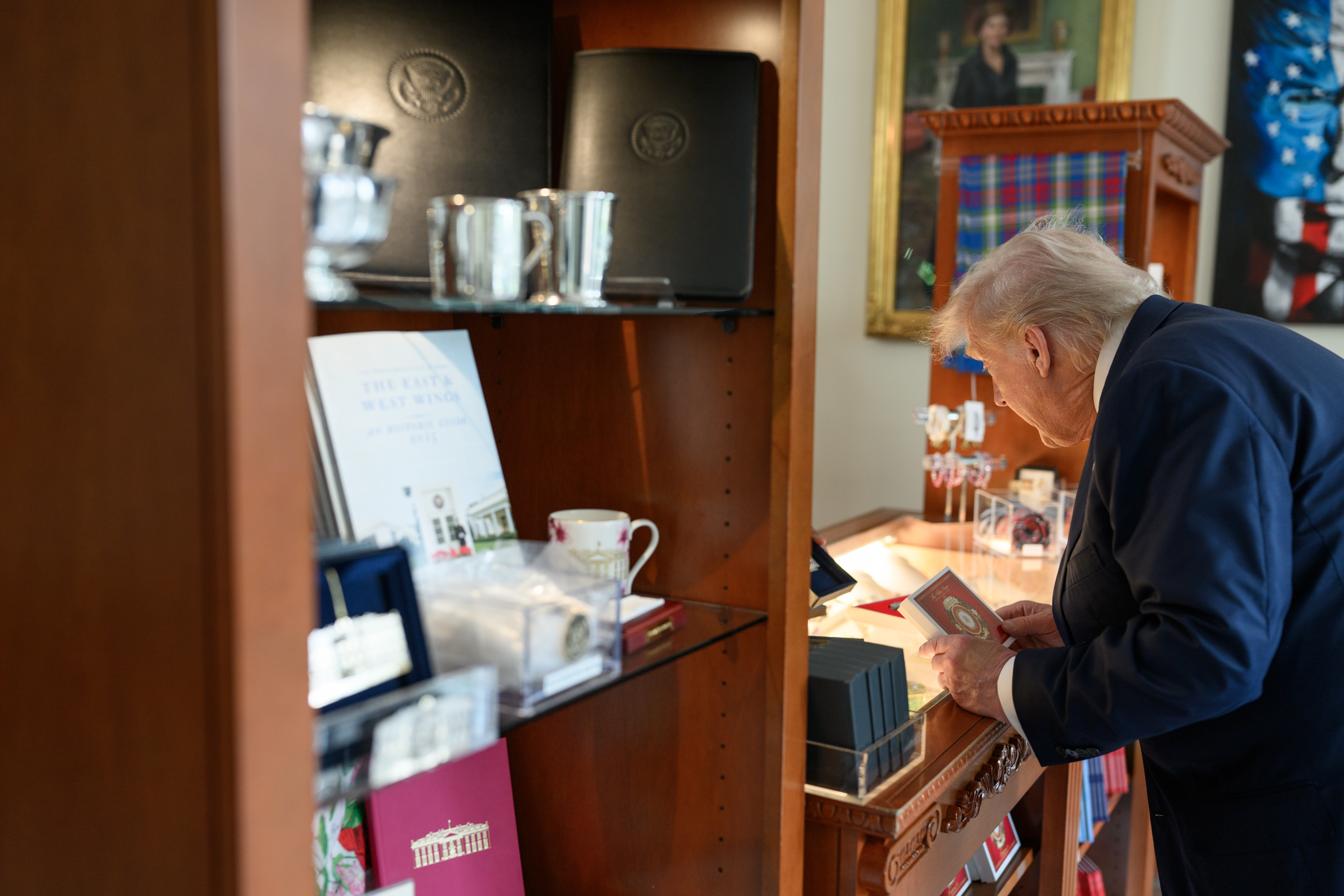 President Donald Trump visits the gift shop in the East Wing of the White House, Tuesday, August 5, 2025. (Official White House Photo by Molly Riley)