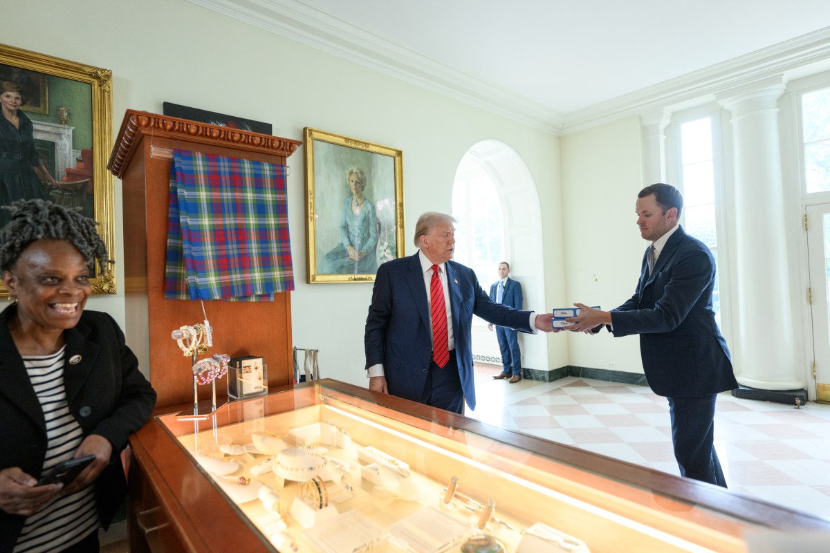 President Donald Trump visits the gift shop in the East Wing of the White House, Tuesday, August 5, 2025. (Official White House Photo by Molly Riley)
