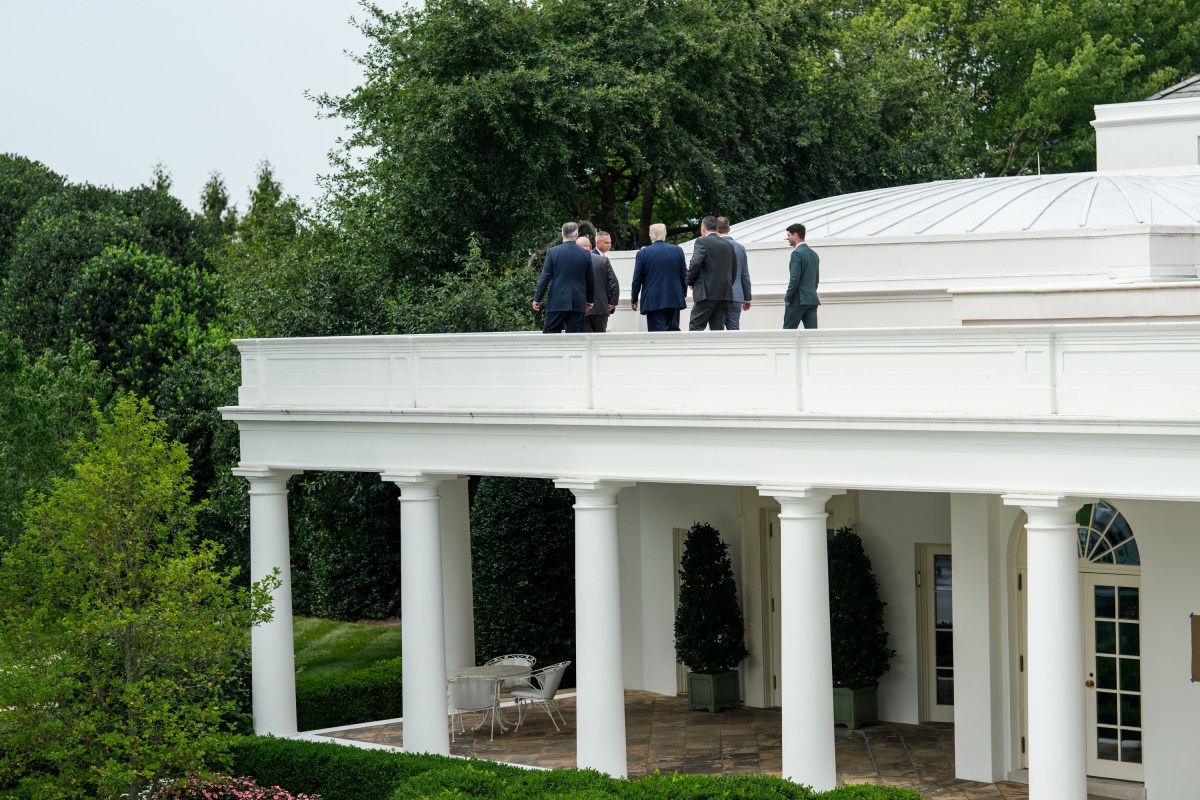 President Donald Trump speaks with Director of Facilities Todd Robinson, architect James McCrery, and others on the roof of the Oval Office of the White House, Tuesday, August 5, 2025. (Official White House Photo by Molly Riley)