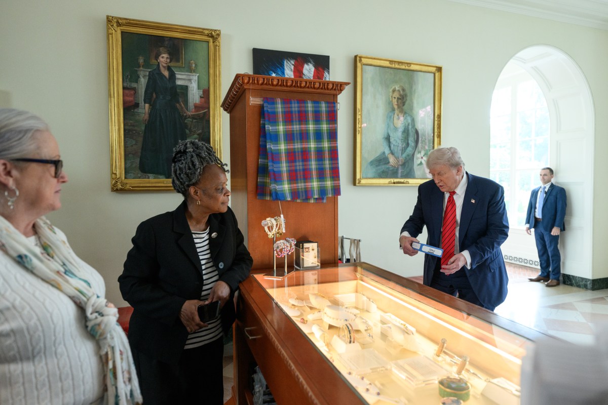 President Donald Trump visits the gift shop in the East Wing of the White House, Tuesday, August 5, 2025. (Official White House Photo by Molly Riley)