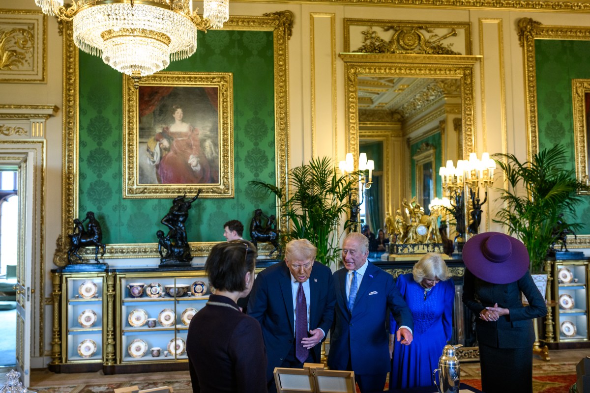 President Donald Trump and First Lady Melania Trump view a collection of American-related items from the royal collection with King Charles III and Queen Camilla in the Green Drawing Room at Windsor Castle in Windsor, England on Wednesday, September 17, 2025. (Official White House Photo by Daniel Torok)