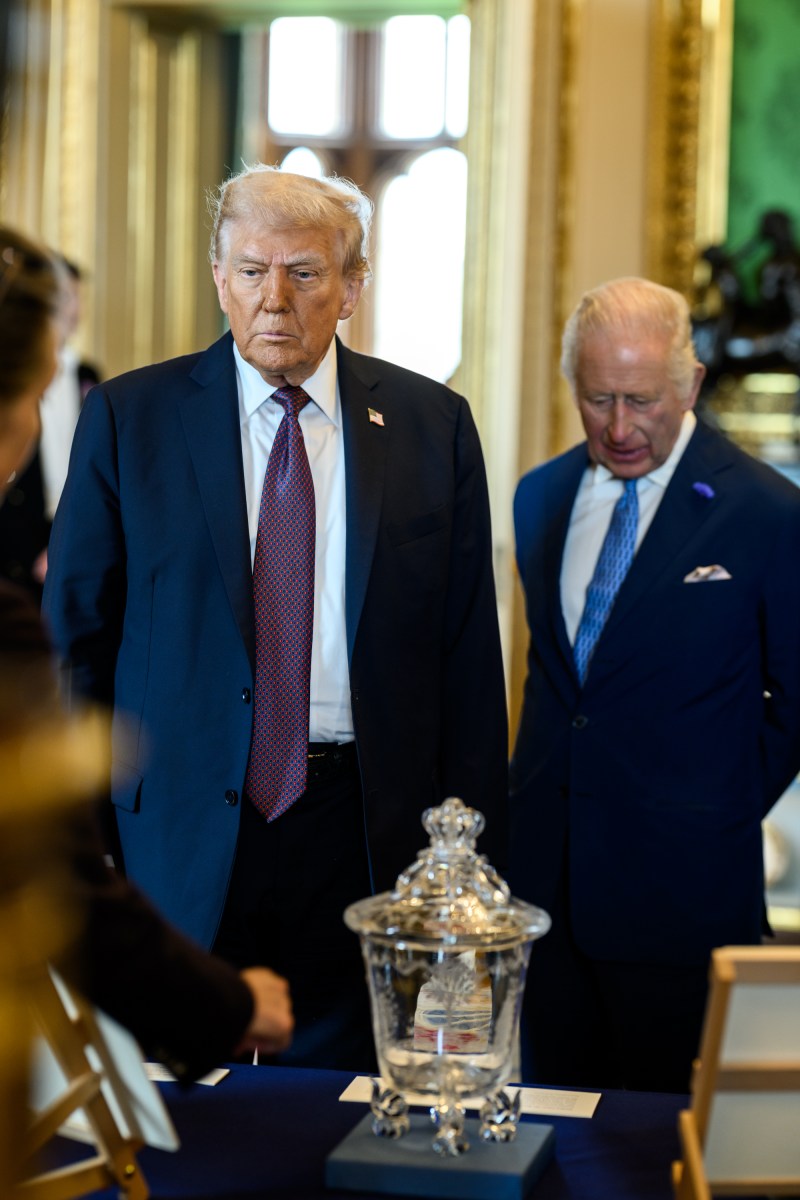 President Donald Trump and First Lady Melania Trump view a collection of American-related items from the royal collection with King Charles III and Queen Camilla in the Green Drawing Room at Windsor Castle in Windsor, England on Wednesday, September 17, 2025. (Official White House Photo by Daniel Torok)