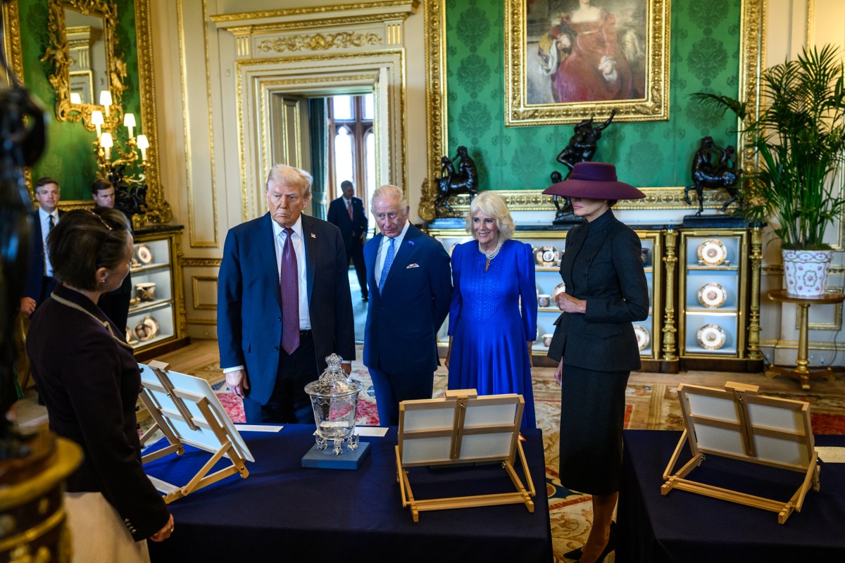 President Donald Trump and First Lady Melania Trump view a collection of American-related items from the royal collection with King Charles III and Queen Camilla in the Green Drawing Room at Windsor Castle in Windsor, England on Wednesday, September 17, 2025. (Official White House Photo by Daniel Torok)
