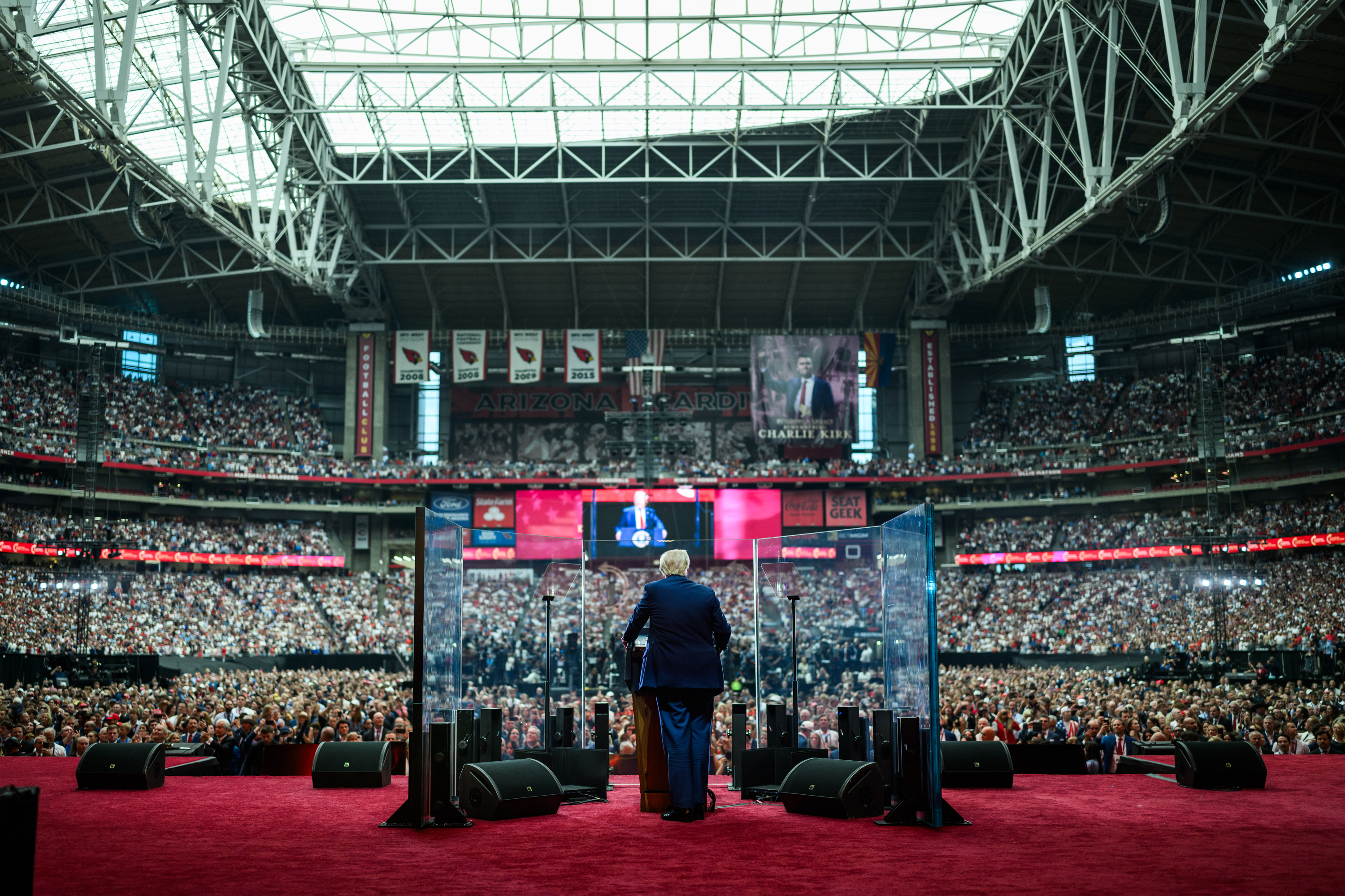 President Donald Trump takes the stage to delivers remarks at the Memorial Service for Charlie Kirk at State Farm Stadium in Glendale, Arizona, Sunday, September 21, 2025. (Official White House Photo by Daniel Torok)