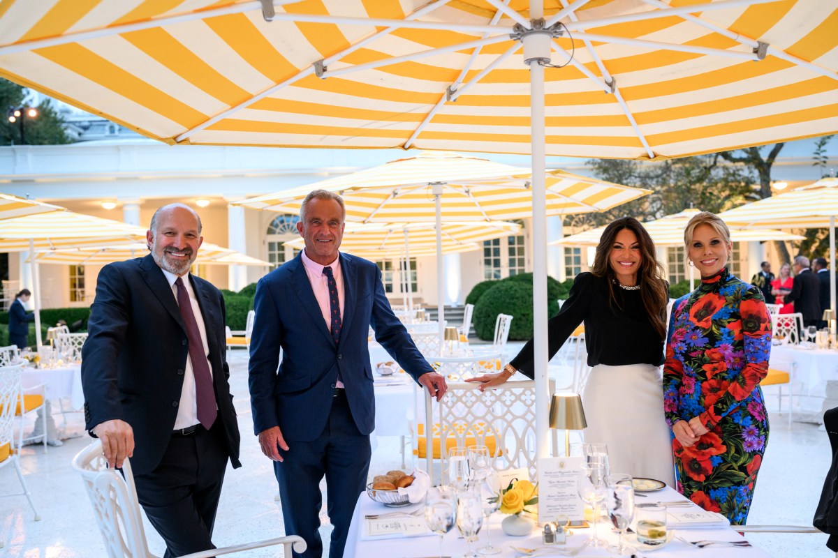 President Donald Trump speaks with Cabinet secretaries and White House staff on the West Colonnade before a dinner in the Rose Garden, Wednesday, September 24, 2025. (Official White House Photo by Molly Riley)