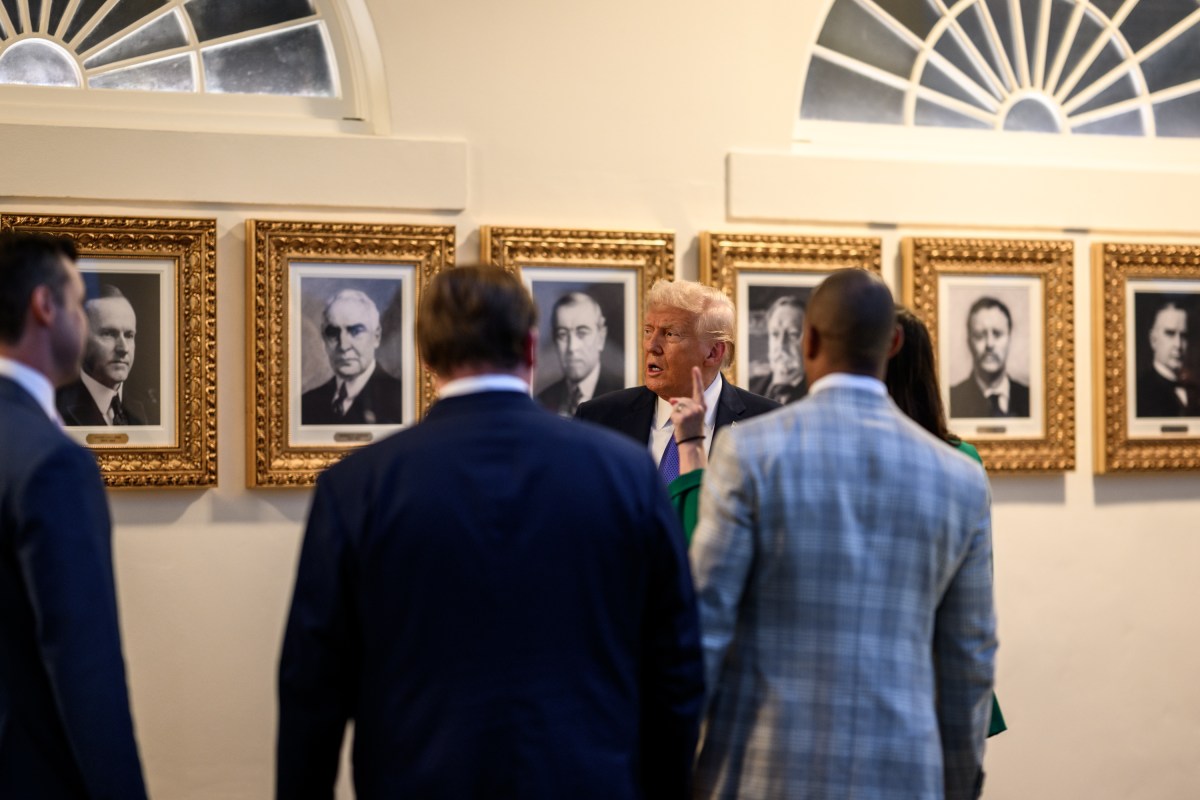 President Donald Trump speaks with Cabinet secretaries and White House staff on the West Colonnade before a dinner in the Rose Garden, Wednesday, September 24, 2025. (Official White House Photo by Molly Riley)