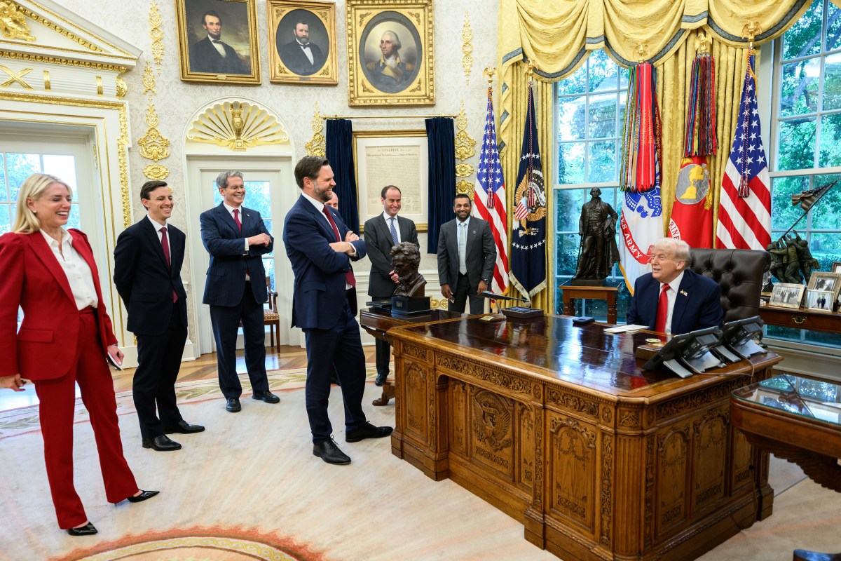 President Donald Trump speaks with Vice President JD Vance and others before signing an executive order allowing a U.S. deal for TikTok, Thursday, September 25, 2025, in the Oval Office. (Official White House Photo by Joyce N. Boghosian)