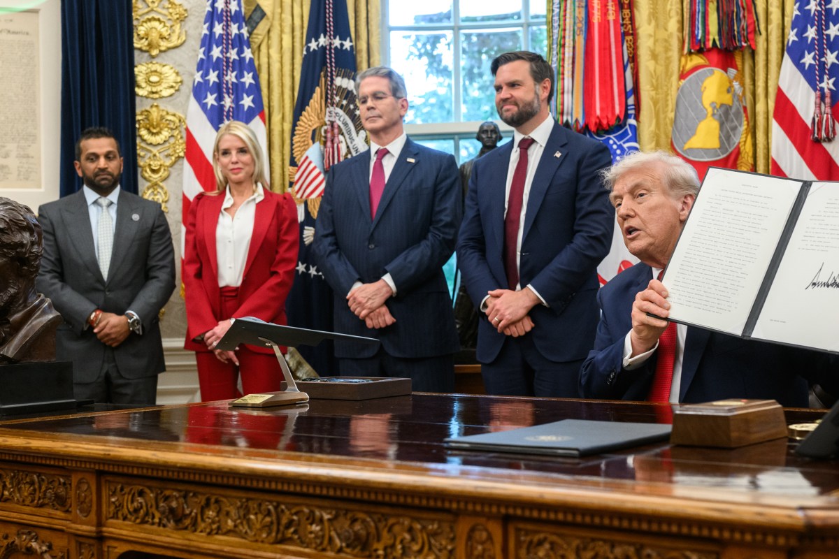 President Donald Trump holds a signed executive order allowing a U.S. deal for TikTok, Thursday, September 25, 2025, in the Oval Office. (Official White House Photo by Joyce N. Boghosian)
