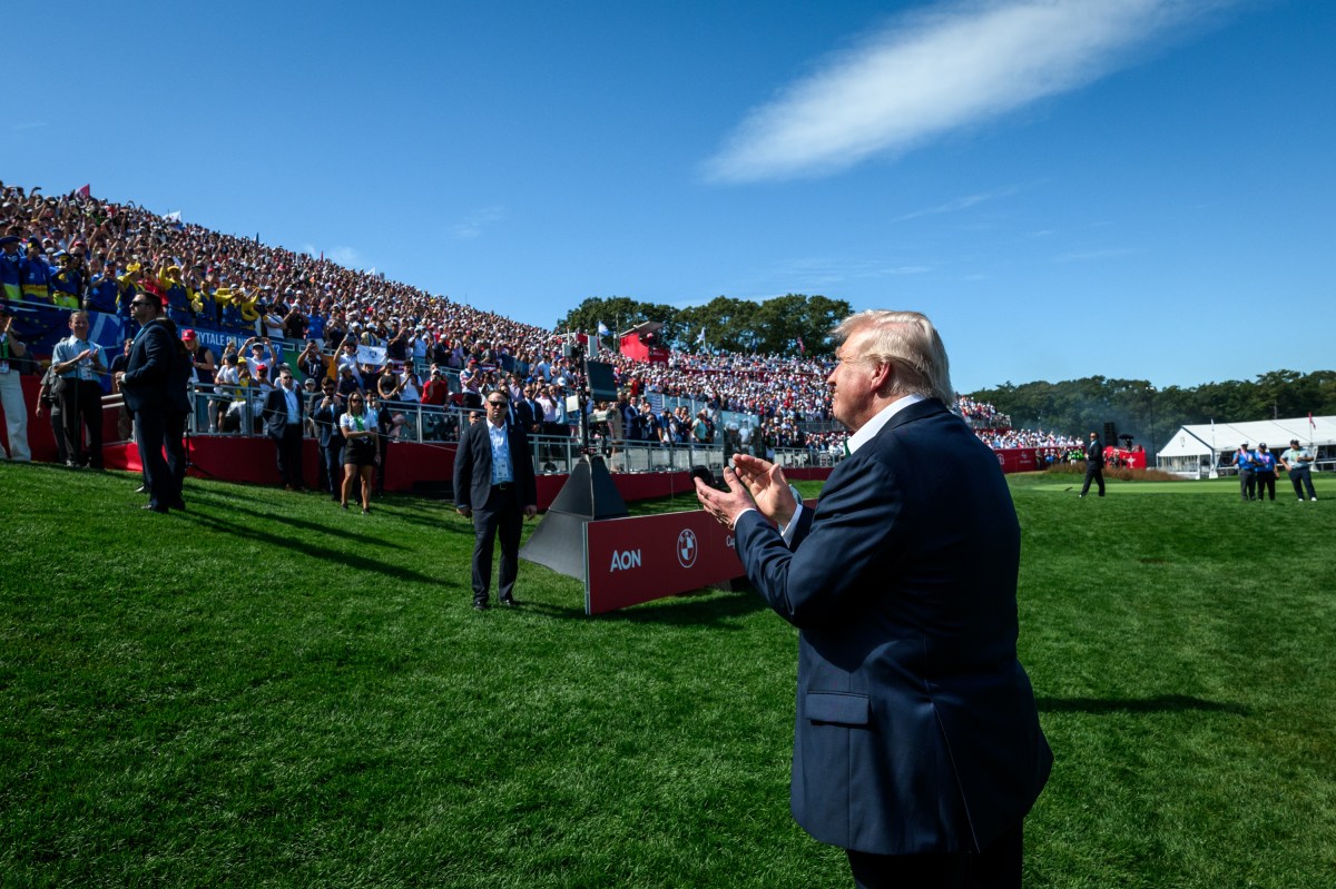 President Donald Trump greets Team U.S. players Bryson DeChambeau and Ben Griffin and waves to the crowds gathered at the first hole of the Ryder Cup Tournament at Bethpage Black Course, Friday, September 26, 2025, in Farmingdale, New York. (Official White House Photo by Joyce N. Boghosian)